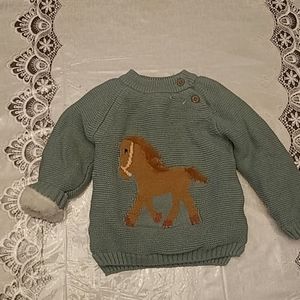 Cozy baby pullover sweater.